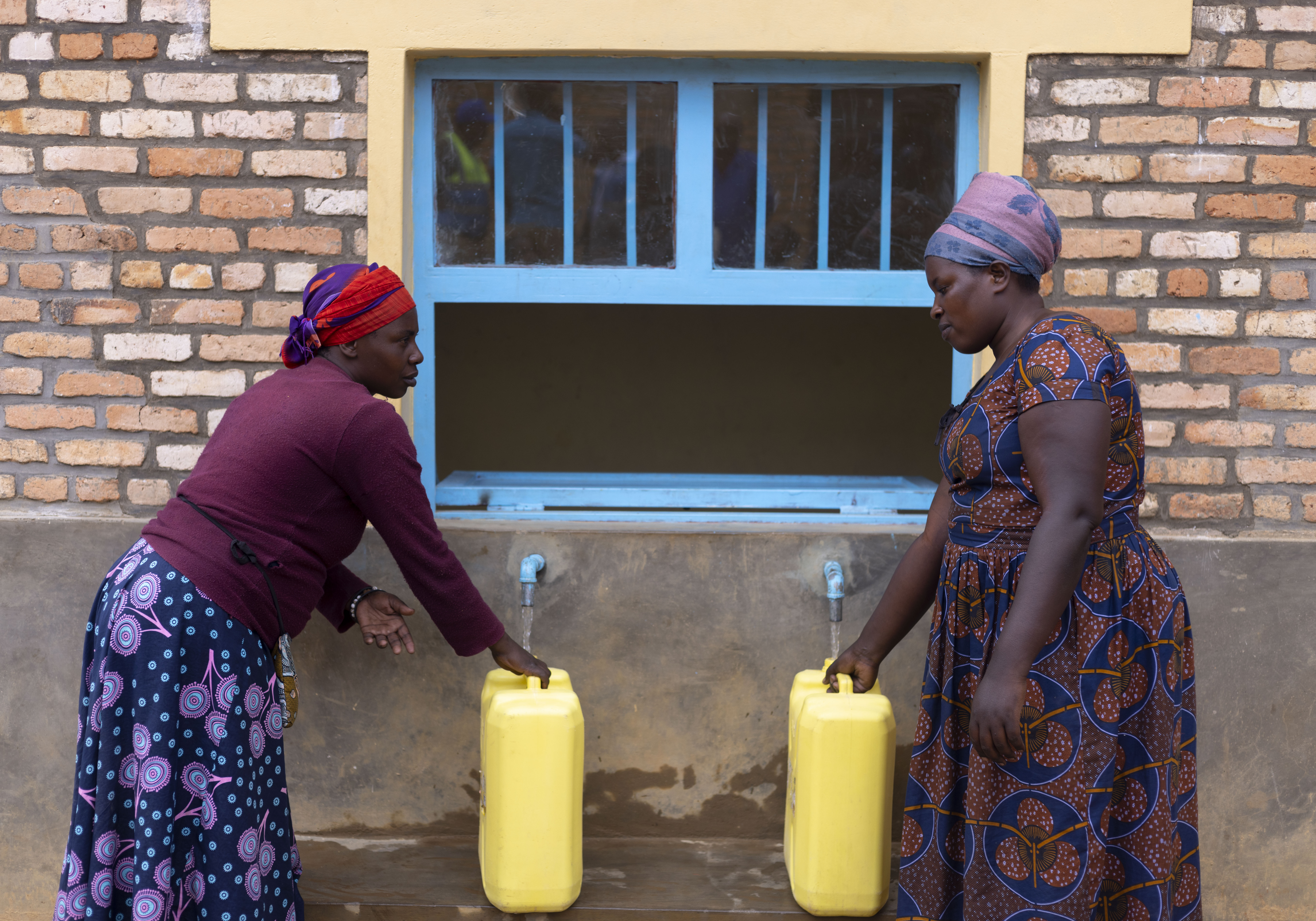 Residents of Tare Sector fetch clean, safe water from the newly upgraded Mabende–Rwufe Water Supply System